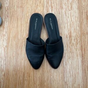 Kelsi Dagger flat mules. Black leather. Size 10.